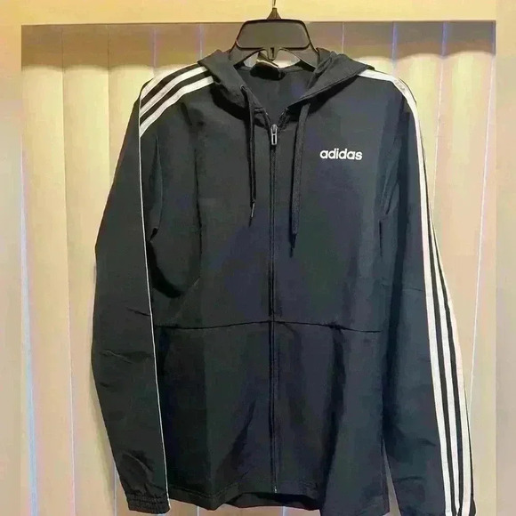 ADIDAS Men's blue Essentials 3-Stripes
Windbreaker. Perfect condition size SMALL - Picture 3 of 13